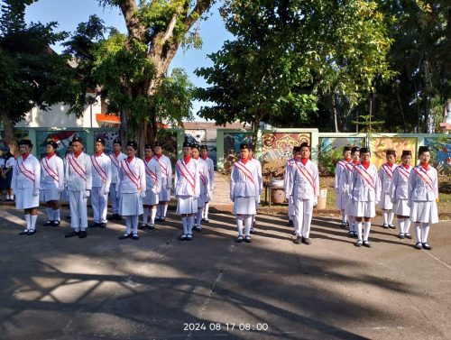 paskibraka (Pasukan Pengibar Bendera Pusaka) dalam moment tugas pengibaran bendera pusaka upacara HUT ke-79 bersama MSA, Suster, Bapak Ibu Guru, Karyawan, Pembantu Pelaksana, Satpam, Karyawan Yayasan perwakilan.  18 Agustus 2024.